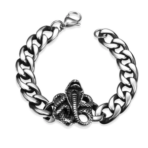 Detail of silver cobra head clasp and polished cuban chain for punk men's bracelet