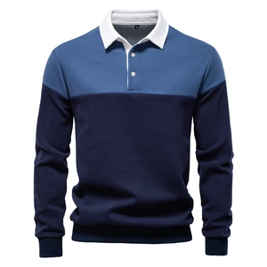 Detail of long sleeve polo sweatshirt with blue and navy color-block design in cotton fabric