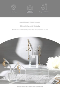 Macro shot of minimalist acrylic jewelry display stand on a white wooden surface