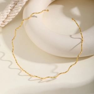 Elegant gold wavy stainless steel choker necklace for women with artistic wave design