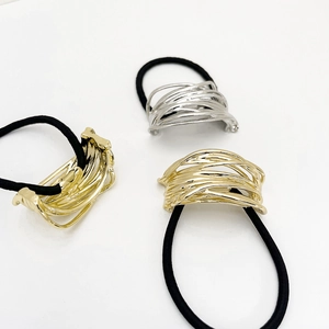 U-shaped alloy hair ties set in gold and silver with irregular metallic net design