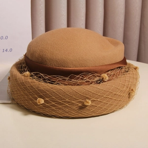 French vintage camel wool beret with veil and decorative ribbon for elegant women