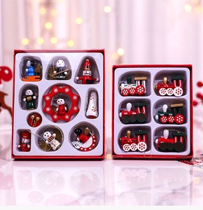 Set of decorative wooden Christmas ornaments featuring mini trains and festive characters