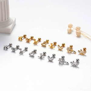 Detailed set of 18 stainless steel stud earrings in gold and silver with zircon accents