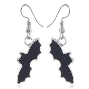 Detail of bat-shaped drop earrings with black oil drip and silver metal edges