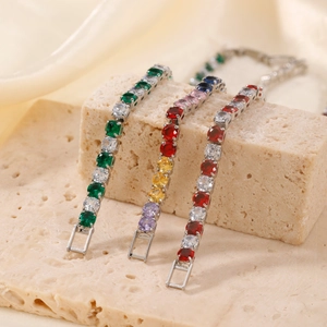 Elegant multi-colored micro-pave stone bracelets on premium beige stone and silk background
