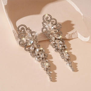 Sparkling silver leaf tassel earrings with clear rhinestones for luxury evening wear