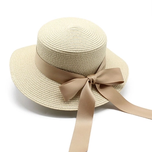 Cappello di paglia a testa piatta da donna con fiocco elegante per spiaggia e protezione solare