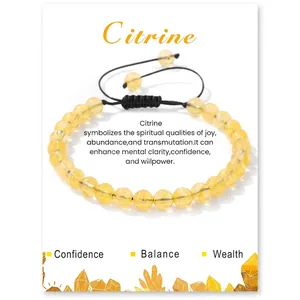 Detail of handmade citrine crystal bead bracelet with adjustable black braided rope cord