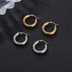 Minimalist 18K gold and silver stainless steel hoop earrings with a polished finish
