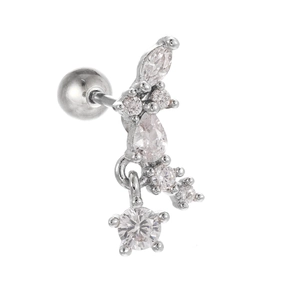 Macro view of silver piercing earring with marquise and round cut shimmering crystals