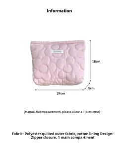 Pink quilted floral makeup bag detail showing polyester fabric and 18x24x5cm dimensions
