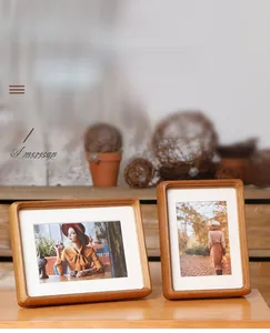 Detail of traditional mortise and tenon joint on retro walnut wood photo frame