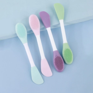 Double-ended silicone facial cleanser and mask applicator brush set in four pastel colors