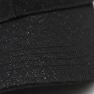 Close-up of black breathable mesh fabric with shimmering silver sequins on a baseball cap