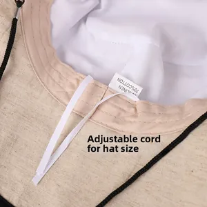 Detail of internal adjustable drawstring on cotton linen sun hat with 70% cotton wash label