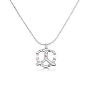 Macro shot of silver pretzel pendant with multi-colored zircons and reflection