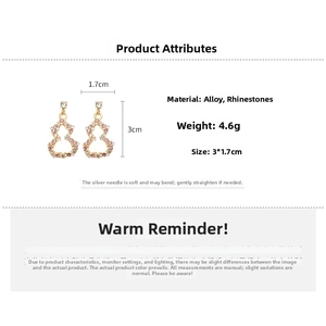 Detailed view of gourd earrings with pink rhinestones and 3cm height dimensions