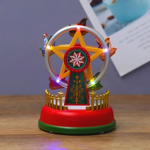Leuchtendes musikalisches Weihnachts-Riesenrad mit bunten LED-Lichtern auf Holztisch