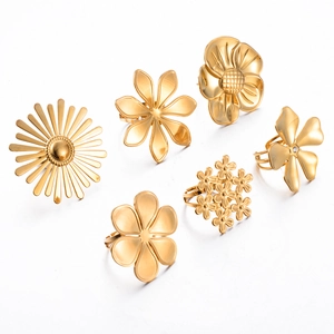 Detailed collection of golden flower rings with cubic zirconia in various floral designs