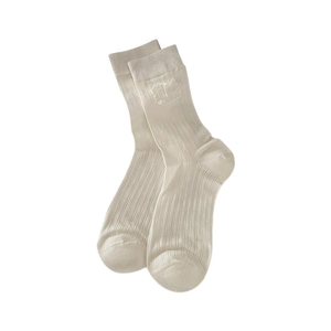 Creamy beige ribbed crew socks with heart embroidery in a clean flat lay minimalist style