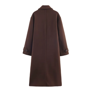 Rear view of long brown wool coat featuring raglan sleeves and cuff straps on white background