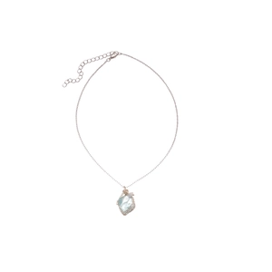 Minimalist stainless steel necklace featuring a light blue raw stone pendant on white background