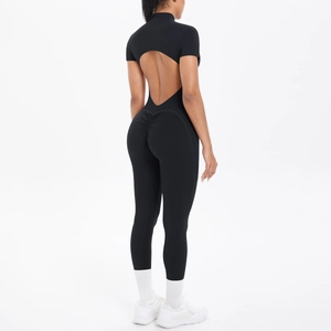 Close-up of black cutout back bodysuit with scrunch butt detail for gym fitness