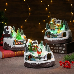 Lighted musical Christmas resin ornament with rotating train and cozy LED snow scene