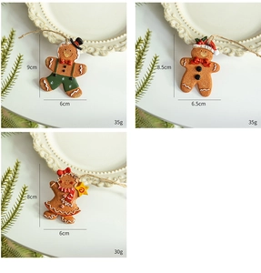 Detailed view of resin gingerbread man ornaments with vintage holiday designs and dimensions