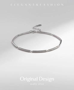 Macro shot of 925 silver chic bracelet featuring crystal encrusted bar segments