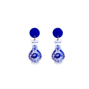 Detail view of Chinese blue and white porcelain style acrylic drop earrings with a vase shape