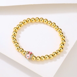 18K gold plated bead bracelet with pink enamel evil eye charm and sparkling crystals
