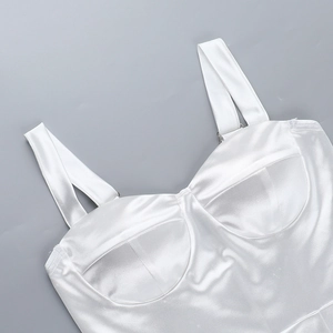 Detail of white satin dress featuring wide straps, built-in cups and premium stitching