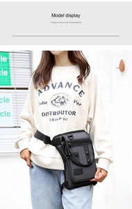 Tactical black nylon thigh bag with adjustable waist straps for outdoor travel and hiking