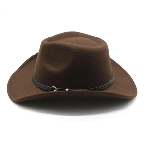 Detailed macro view of dark brown wool felt cowboy hat with black belt and silver buckle