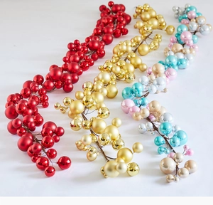 Close-up of glossy, matte and diamond-cut Christmas ball ornaments in multiple colors