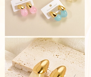 Detailed macro view of colorful resin teardrop earrings with gold stainless steel finish