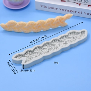 Twisted rope texture silicone mold for fondant and cake decorating on a blue background