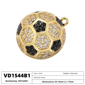 Detailed close-up of a 15mm gold soccer ball pendant with black and white zircon pavé