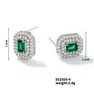Detail view of vintage copper earrings with emerald-cut zircon and white diamonds