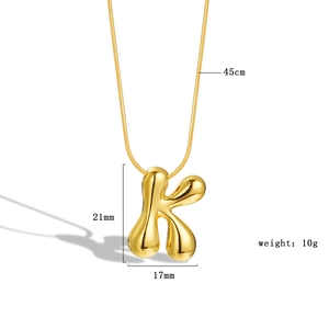 Detail of gold puffed letter K necklace showing 45cm chain and 21x17mm pendant size