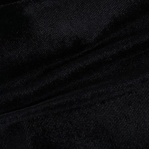 Close-up of black velvet fabric with vertical striped texture and fine fiber details