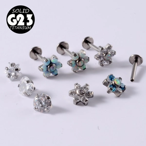 Detailed collection of G23 titanium labret studs featuring opal and zircon insets