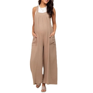 Detail of breathable cotton linen maternity overalls in brown with large pockets