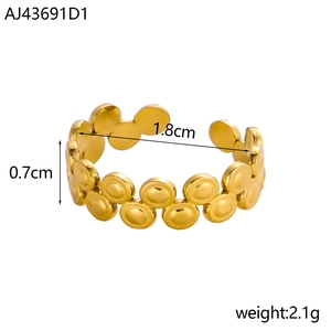 Detailed view of golden textured ring showing 0.7cm height and 1.8cm inner diameter