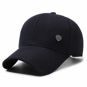 Classic navy blue baseball cap for men featuring a metallic shield emblem and textured fabric