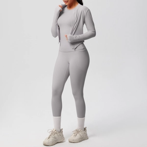 Close-up of light gray yoga set fabric detail and convenient side pocket on leggings