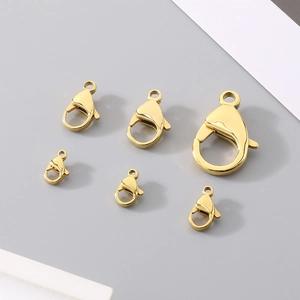 Detail view of 18k gold plated lobster clasps in various sizes for DIY jewelry making