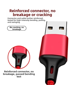 Close-up of durable reinforced 3-in-1 nylon braided USB cable with red metal housing